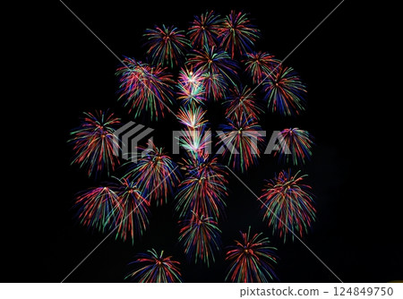 A series of colorful fireworks bursting into the midnight sky 124849750
