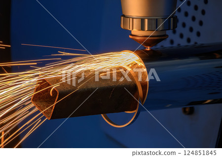Close up scene the fiber laser cutting machine cut the stainless steel tube and sparkling light. Close up scene the fiber laser cutting machine cut the stainless steel tube and sparkling light. 124851845