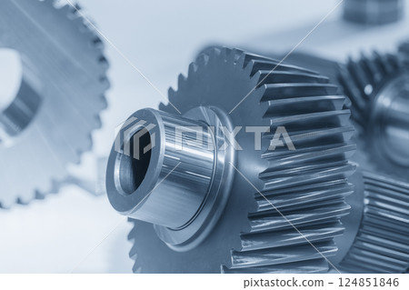 Close up the transmission bevel gear spare parts in the light blue scene. 124851846