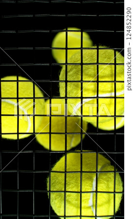 Tennis balls on rocket strings. Tennis balls on rocket strings. 124852290