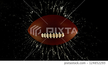 Detail of american football ball with splashing water. Isolated on black background. Detail of american football ball with splashing water. Isolated on black background. 124852293