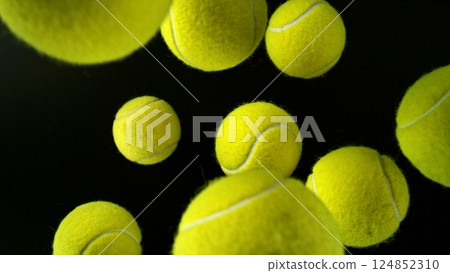 Tennis balls on black background 124852310