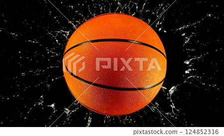 Detail of basketball ball, top view with splashing water. Isolated on black background. 124852316
