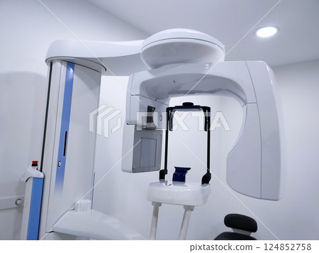 Cone beam computer tomography and protective cape in clinic 124852758