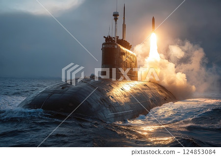 Nuclear war. Launch of a nuclear ballistic intercontinental missile from submarine. An intercontinental nuclear missile launches from the submarine, signaling potential global annihilation. 124853084