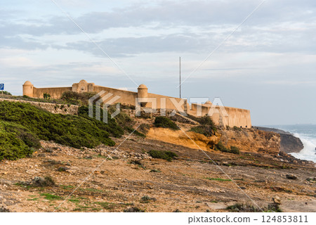 The Forte de Sao Jorge de Oitavos overlooks the Atlantic Ocean in beautiful Cascais, Portugal. The Forte de Sao Jorge de Oitavos overlooks the Atlantic Ocean in beautiful Cascais, Portugal. 124853811
