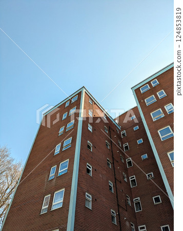 Top Floors of a Highrise Council Block of Flats Apartments with Blue Sky Top Floors of a Highrise Council Block of Flats Apartments with Blue Sky 124853819