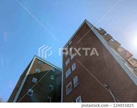 Top Floors of a Highrise Council Block of Flats Apartments with Blue Sky Top Floors of a Highrise Council Block of Flats Apartments with Blue Sky 124853825