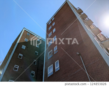 Top Floors of a Highrise Council Block of Flats Apartments with Blue Sky 124853826