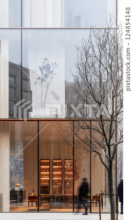 Modern architecture features glass facade and minimalist design in urban setting 124854148