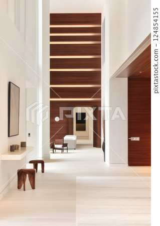 Modern interior design in a spacious minimalist living area with wooden accents and natural light 124854155