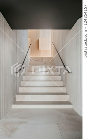Elegant staircase leading to a warmly lit space in a modern architectural design Elegant staircase leading to a warmly lit space in a modern architectural design 124854157