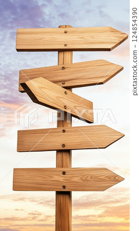 Five blank wooden arrow signs on a wooden post point in various directions against a sunset sky, symbolizing choices, decisions, and the concept of fobo - fear of better options - 124854390