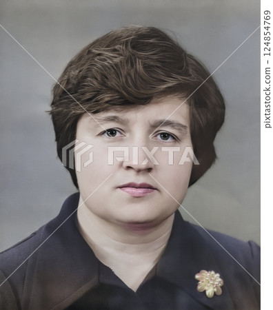 Vintage portrait of attractive middle-aged woman dressed in a strict style. Retro photo from 1979. Vintage portrait of attractive middle-aged woman dressed in a strict style. Retro photo from 1979. 124854769