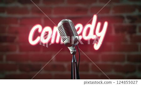 Vintage microphone stands ready on a stage, bathed in the glow of a neon comedy sign against a brick wall, setting the scene for an evening of laughter and entertainment 124855027