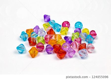 Colored beads for design on a white background Colored beads for design on a white background 124855096