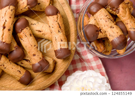 Sticks shortbread dipped in chocolate. Home made cookies Sticks shortbread dipped in chocolate. Home made cookies 124855149