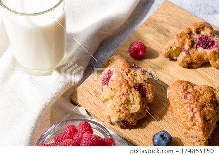 Pear and raspberry scones. Fresh pastries Pear and raspberry scones. Fresh pastries 124855150