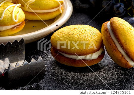 Homemade round lemon cookies. French sweet yellow cookies macarons 124855161