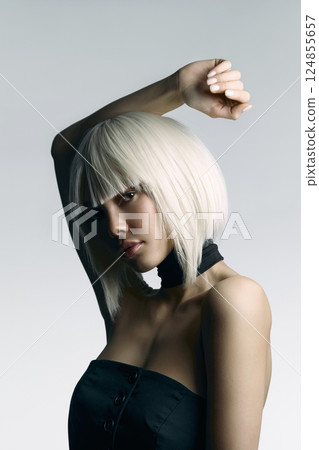 beautiful blond hair young woman. fringe and bob hairstyle. fashion girl with white hair 124855657