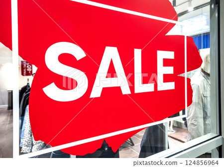 Sale sign showcase at a clothes stor 124856964