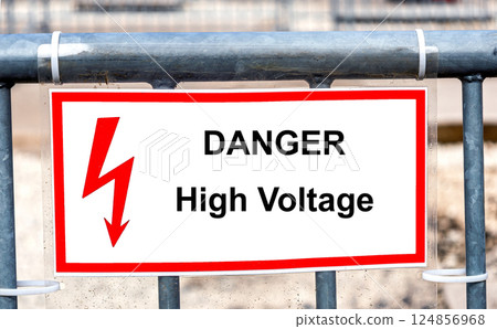 High voltage danger sign on the fence for caution and security 124856968