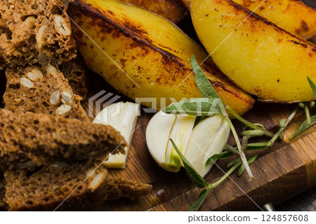 Herring with onions in a glass jar with potatoes 124857608