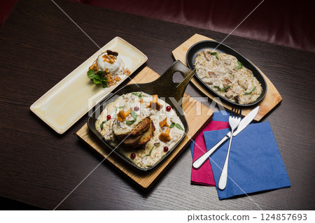 Set of potato pancakes with mushrooms, meat in 124857693
