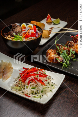 A set of Japanese dishes on the table A set of Japanese dishes on the table 124858068