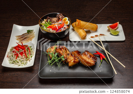 A set of Japanese dishes on the table 124858074