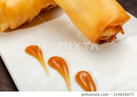Japanese stuffed pancakes on a white plate with Japanese stuffed pancakes on a white plate with 124858075