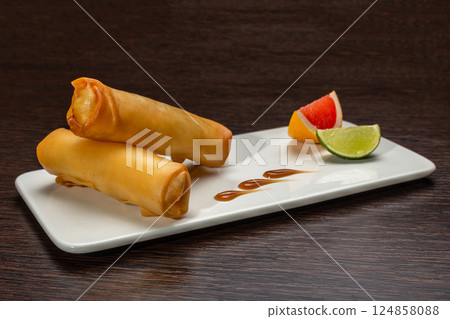 Japanese stuffed pancakes on a white plate with 124858088