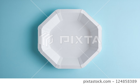 Minimalist White Octagonal Plate on Soft Blue Background 124858389
