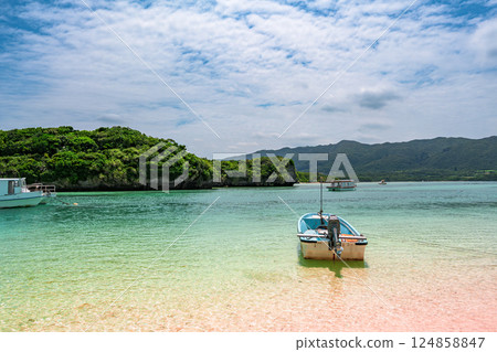The beautiful emerald green waters of Kabira Bay The beautiful emerald green waters of Kabira Bay 124858847