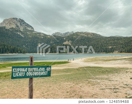 Sign warning about swimming in the Black lake, Durmitor national park 124859488