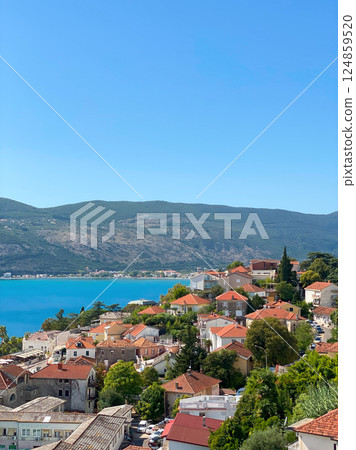 Tile roofs of Herceg Novi and the bay of Kotor 124859520