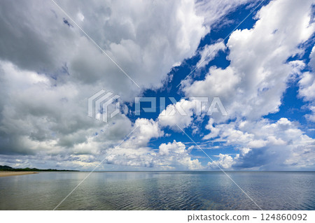 A refreshing landscape photo of Ishigaki Island with clear blue skies and white clouds 124860092