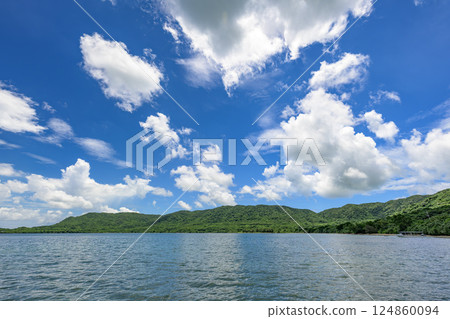 A view of Ishigaki Island's natural beauty with a striking contrast between the blue sky and clouds 124860094