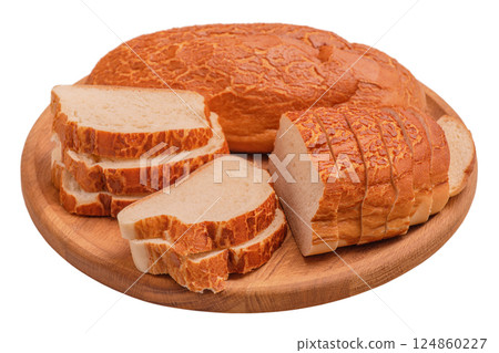 Bread whole and sliced on a wooden round board isolate on white. Food, bread. Bread whole and sliced on a wooden round board isolate on white. Food, bread. 124860227