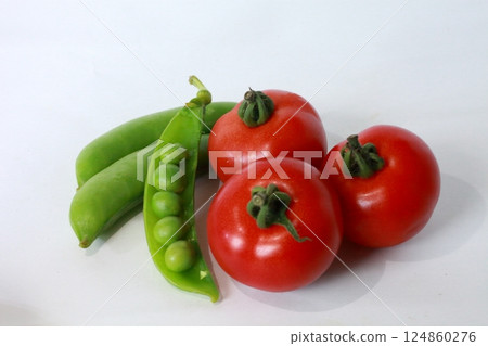 Fruit tomatoes and snap peas 124860276