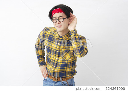 Akihabara-style man listening with hand on ear, white background Akihabara-style man listening with hand on ear, white background 124861000
