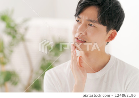 Young men doing skin care 124862196