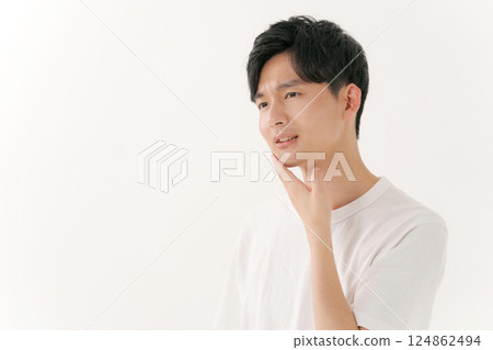 Man taking care of his skin Man taking care of his skin 124862494