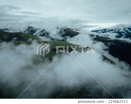 Aerial view of beautiful high altitude forest grassland mountain landscape 124862521