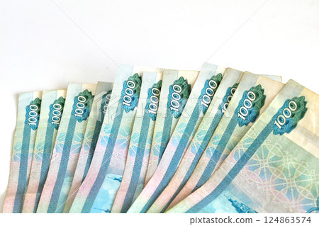 Russian currency lies in a row 124863574