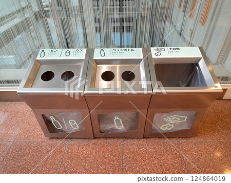 Separated trash bins installed in public facilities Separated trash bins installed in public facilities 124864019