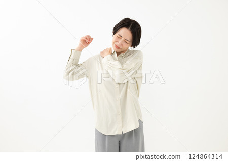 Middle-aged woman suffering from stiff shoulders 124864314
