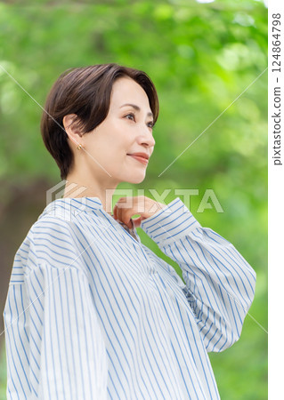Fresh greenery Middle-aged woman Beauty 124864798