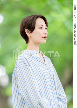 Fresh greenery Middle-aged woman Beauty 124864803