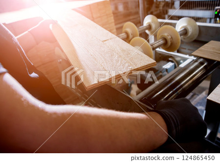 Carpenter with fibreboards at furniture factory workshop. Woodworking industry Carpenter with fibreboards at furniture factory workshop. Woodworking industry 124865450